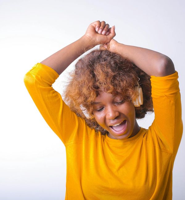 Woman feeling vibrant and energetic after a yoga session.